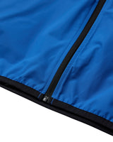 Close-up of a bright blue fabric item with a black zipper and black trim along the edge, photographed against a white background.