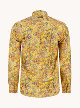 Yellow floral patterned shirt on a white background