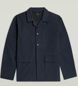 Navy jacket with button details on a light gray background