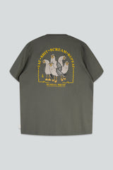 A dark olive green short-sleeve t-shirt shown from the back, featuring a large graphic print of four cartoon seagulls in yellow, gray, and white, with the text 'EAT, SHIT, SCREAM, REPEAT' and 'SEAGULL SQUAD'.