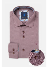 A folded men's dress shirt by Berretti, featuring a small-scale red and white gingham pattern with a light blue and white floral lining. The shirt is displayed on a clean white background with a circular inset showing a close-up of the cuff and button details.