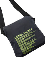 Navy shoulder bag with yellow text on a white background