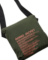 Green bag with red text on a white background