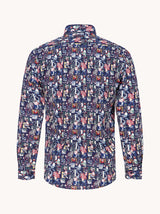 A long-sleeve button-up shirt with a dense, all-over abstract pattern in navy blue, pink, red, and white, shown against a plain off-white background.