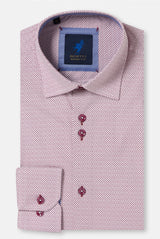 Pink patterned dress shirt with a blue label on a white background