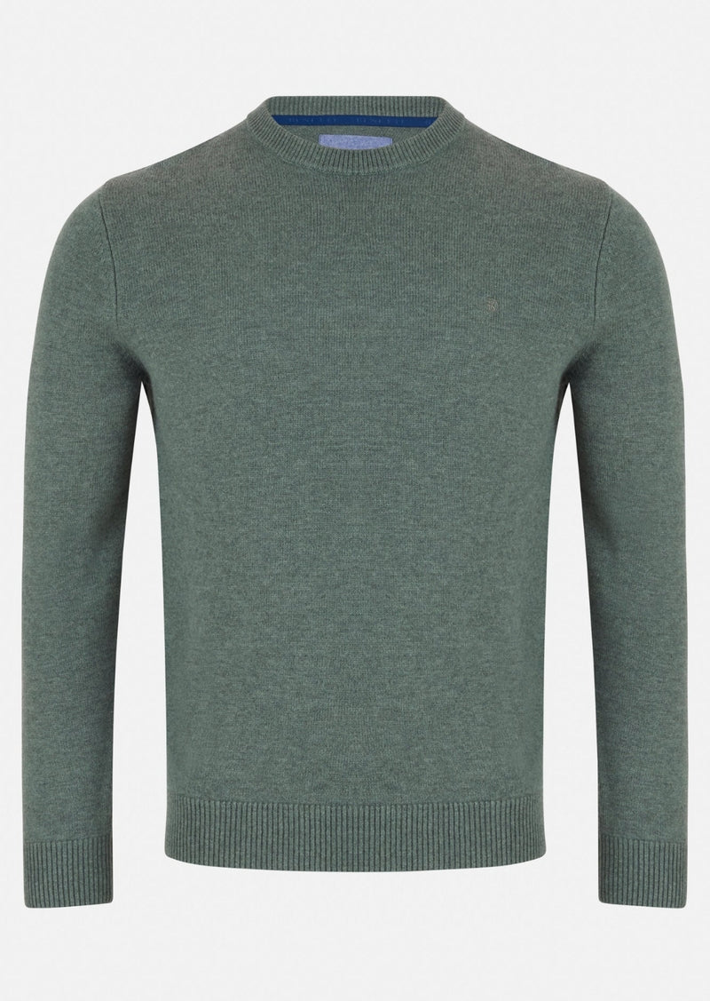 Green sweater on a white background