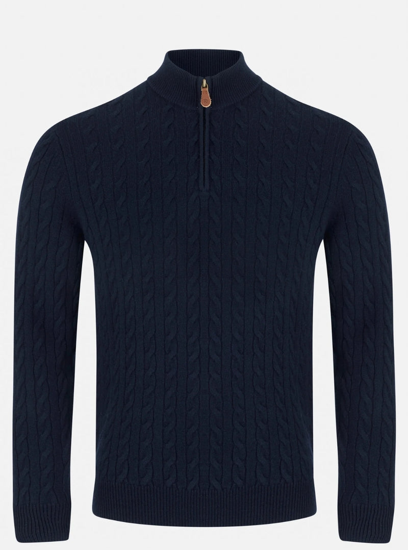 Navy cable knit sweater with a quarter zip on a light gray background