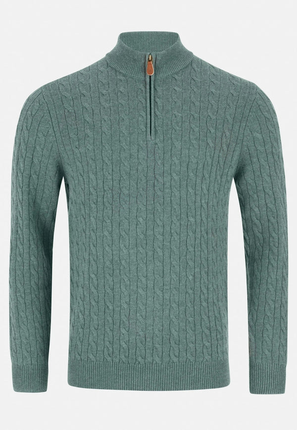 Green cable knit sweater with a zipper on a white background
