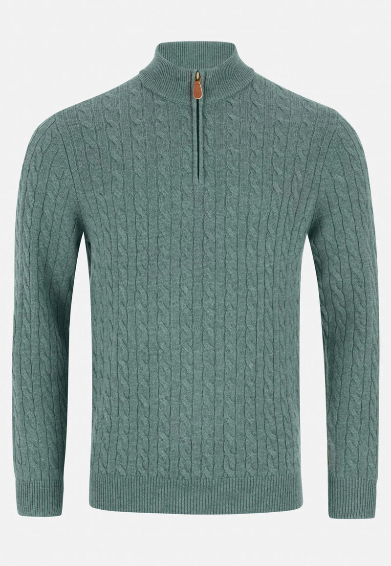 Green cable knit sweater with a zipper on a white background