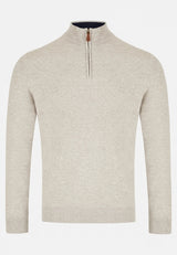 Beige sweater with a zipper on a white background