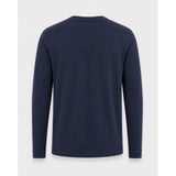 A navy blue long-sleeve crewneck shirt shown from the back, displayed on a light gray background.