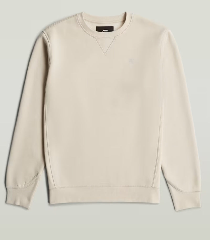 Beige sweatshirt on a light gray background