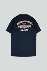 A navy blue short-sleeve t-shirt shown from the back, featuring a large graphic print of a salmon with the text 'THE SMOKING SALMON' and 'LAKOR' in pink and white.