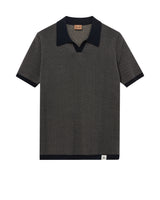  polo shirt with navy collar on a white background