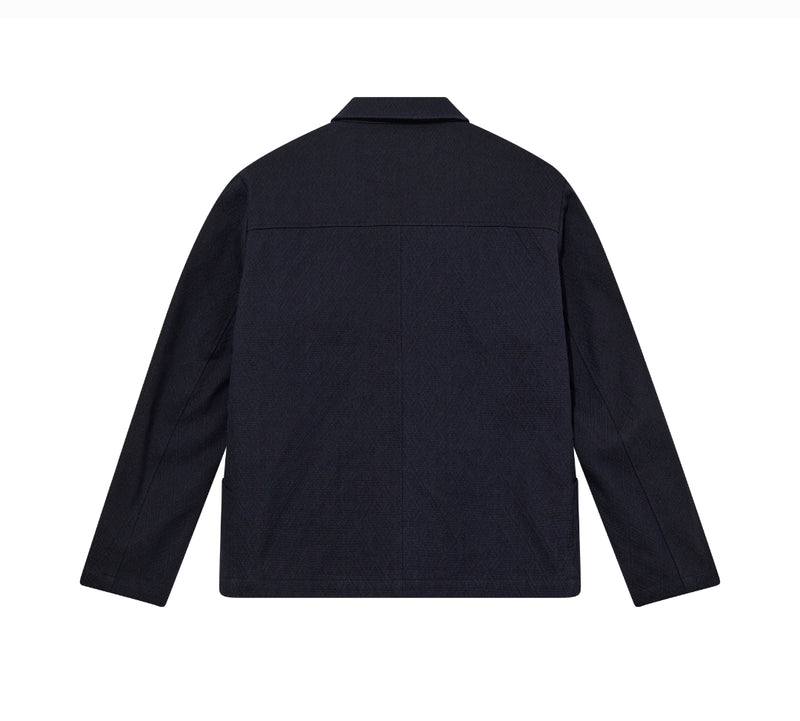 Navy jacket shown from the back on a white background