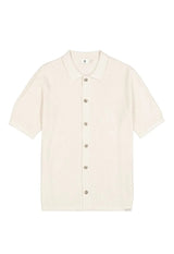 Beige short-sleeve shirt on a white background