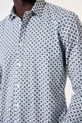 Close-up of a patterned shirt with a neutral background