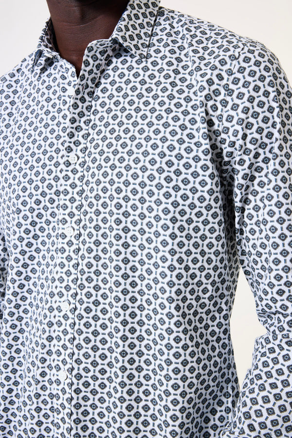 Close-up of a patterned shirt with a neutral background