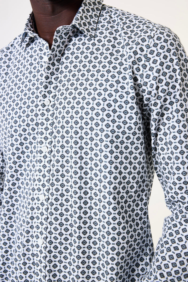 Close-up of a patterned shirt with a neutral background